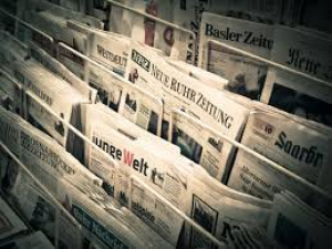 Newspapers in rack