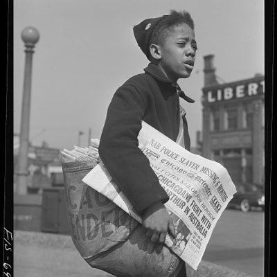 Newsboy selling the Chicago Defender, Paul Delano for the Office of War Information,, 1942