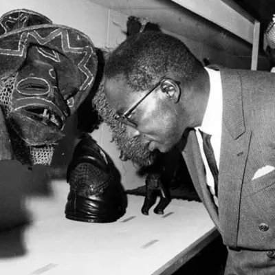 President Leopold Senghor viewing African art at the Musée Dynamique, during the Festival Mondial des Arts Nègres, Dakar, 1966.